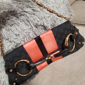 Pink and black GG canvas horsebit clutch